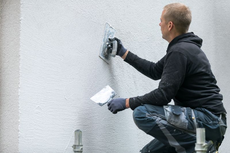 Local Stucco Repainting pros at work